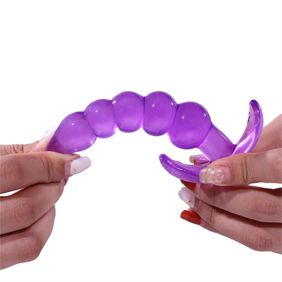 Enchufe de goma del extremo de la TPE del placer del enchufe de la prenda impermeable flexible anal desigual de la púrpura con las gotas anales ampliadas lisas