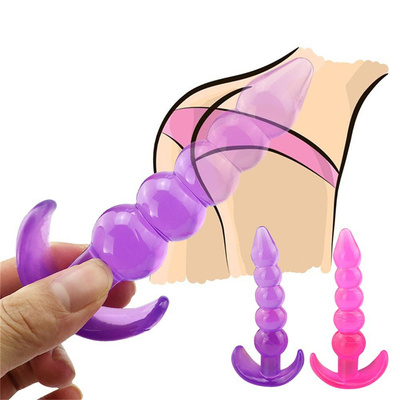 Enchufe de goma del extremo de la TPE del placer del enchufe de la prenda impermeable flexible anal desigual de la púrpura con las gotas anales ampliadas lisas