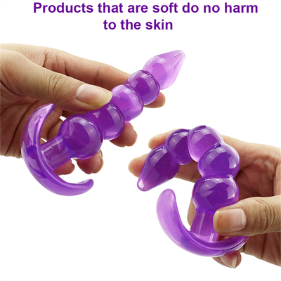 Enchufe de goma del extremo de la TPE del placer del enchufe de la prenda impermeable flexible anal desigual de la púrpura con las gotas anales ampliadas lisas